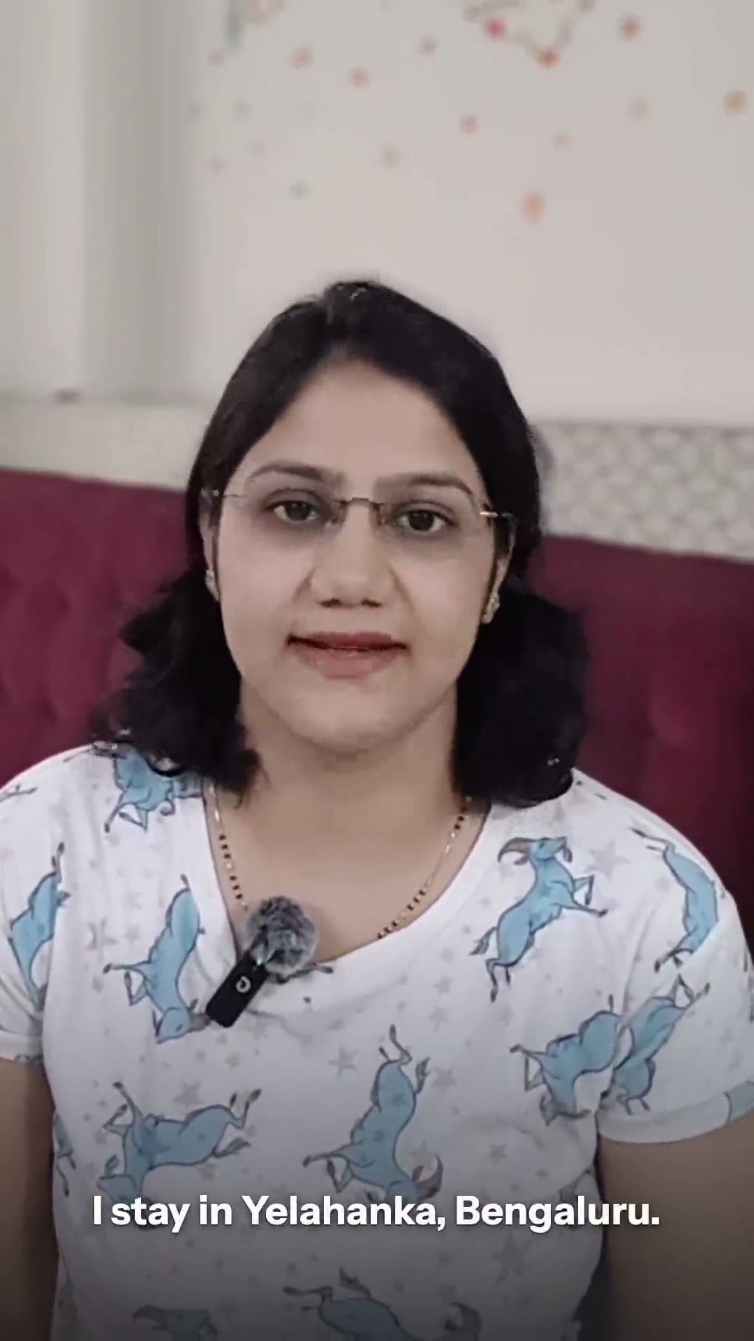 A parent speaking to camera at home.